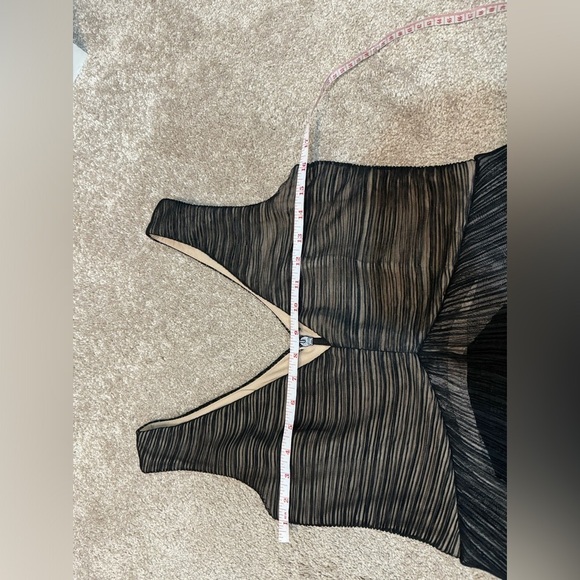 BCBG black dress in size Medium. Place offer I will defently consider Thanks. - Picture 7 of 10